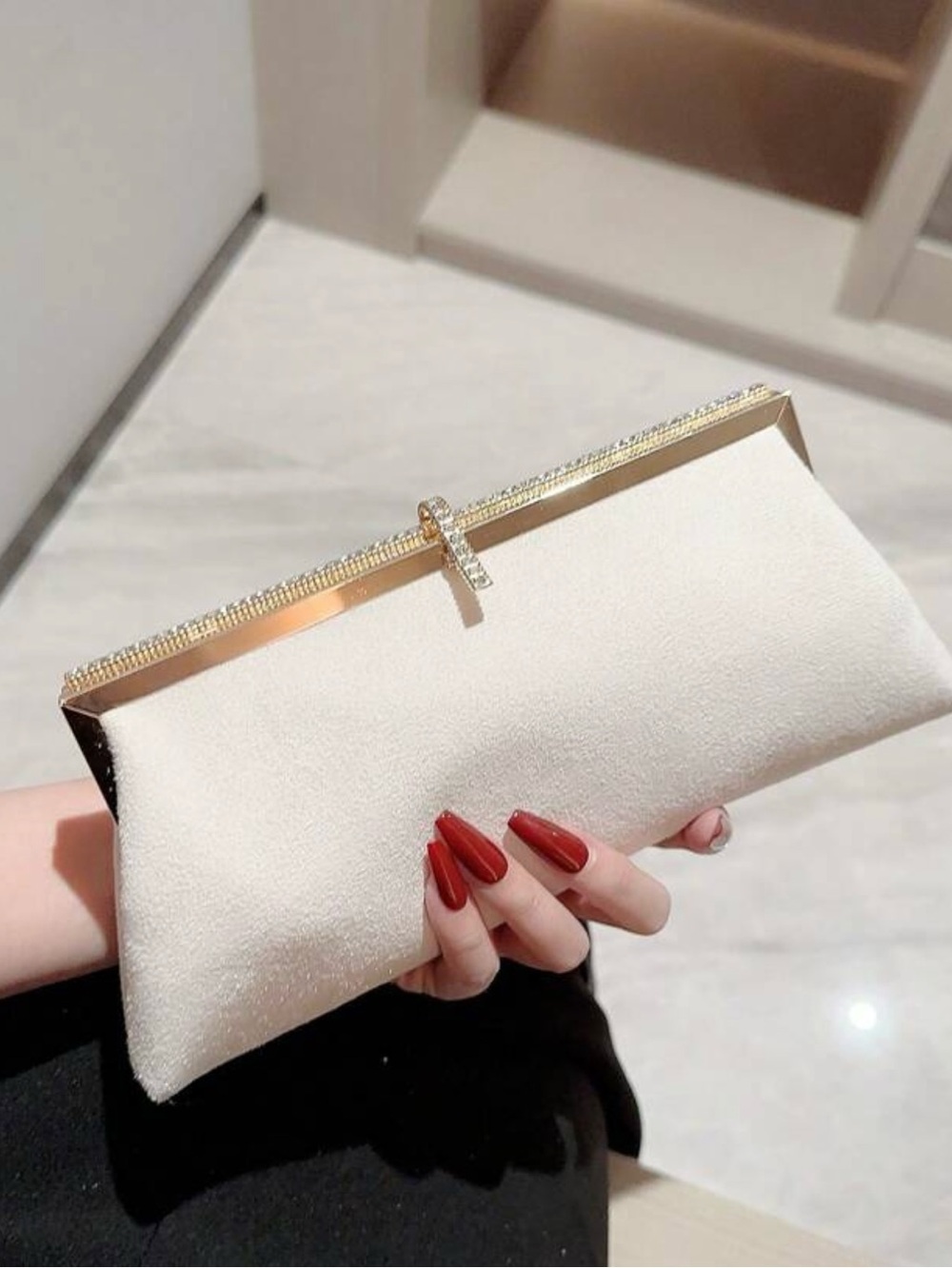 Elegant Cream Evening Clutch with Gold Accents